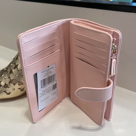 Kate Spade Carey Medium Compartment Bifold Wallet
COLOR: Conch Pink - Picture 7 of 16